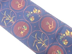 丸紋に草葉模様織出し袋帯